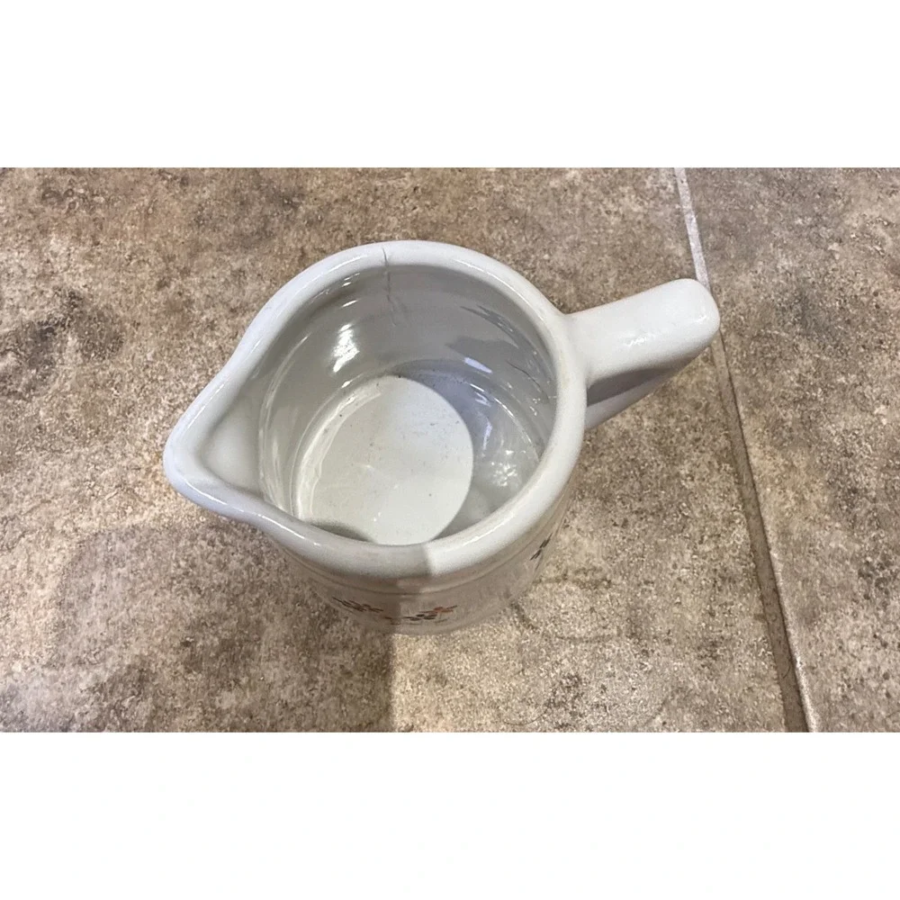 Vintage ceramic‎ 3/4 cup measuring pitcher with charming floral design.